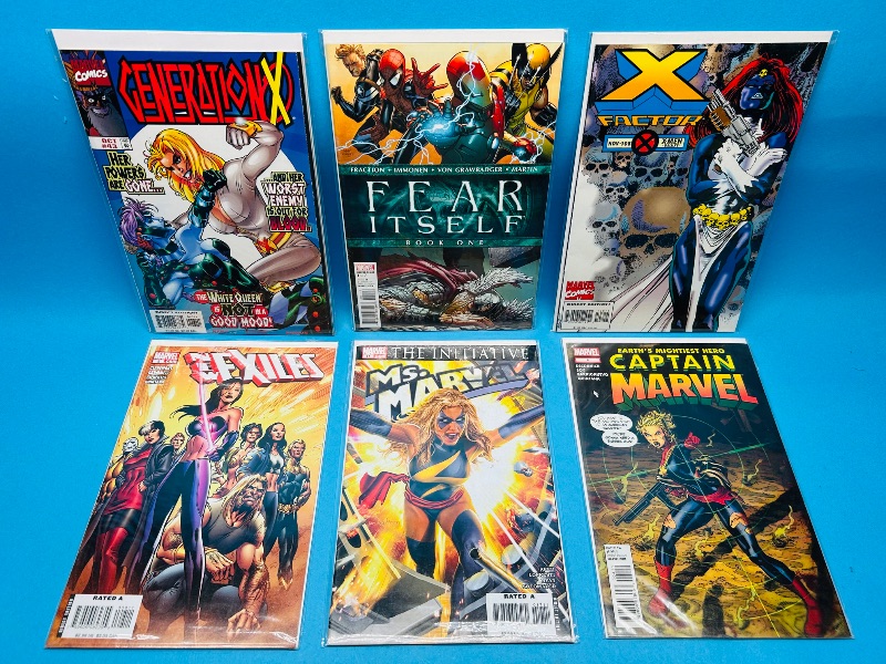 Photo 1 of 165195…6  comics in plastic sleeves 