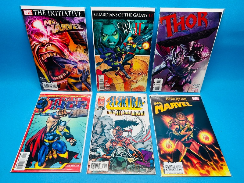 Photo 1 of 165196…6  comics in plastic sleeves 
