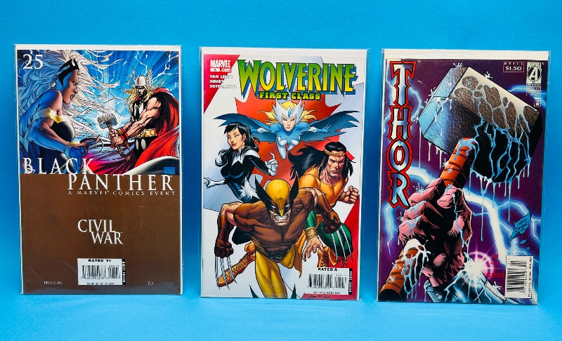Photo 1 of 165197…3  comics in plastic sleeves 