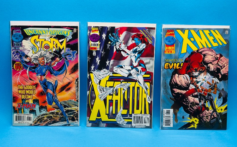 Photo 1 of 165205…3  comics in plastic sleeves 