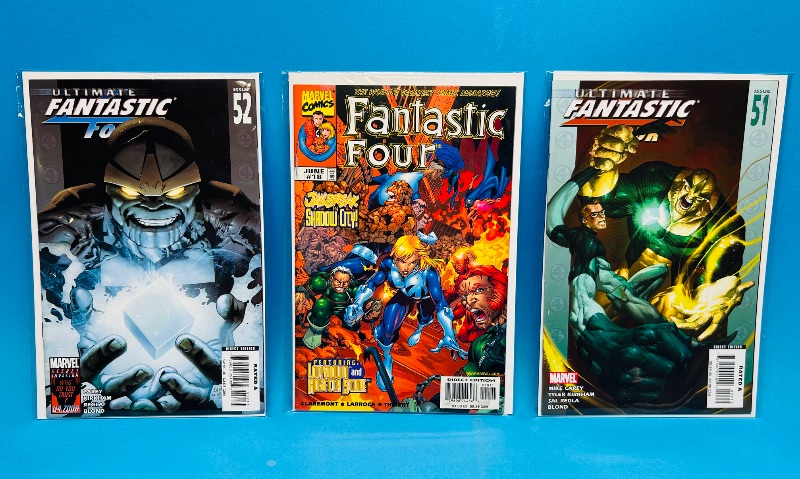Photo 1 of 165235…3 fantastic four comics in plastic sleeves 