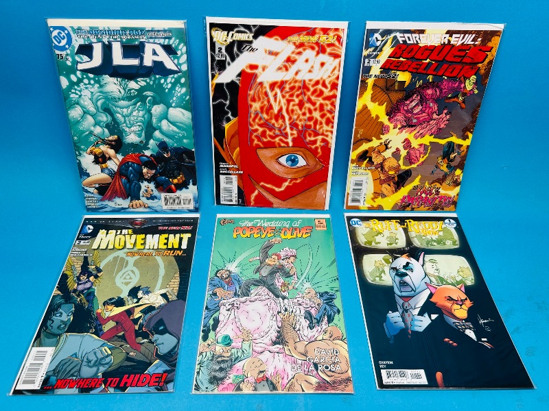 Photo 1 of 165267…6  comics in plastic sleeves 