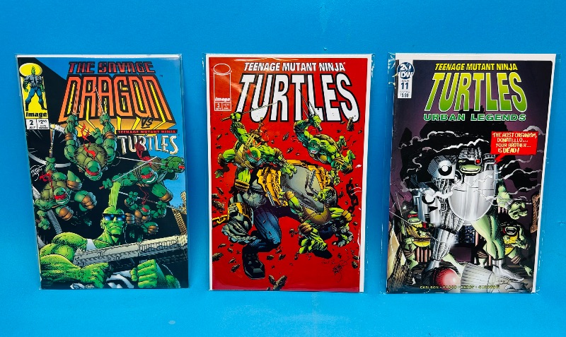 Photo 1 of 165271…3 teenage Mutant Ninja Turtles  comics in plastic sleeves 