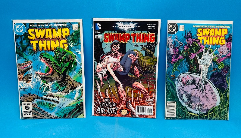 Photo 1 of 165279…3 vintage swamp thing  comics in plastic sleeves 