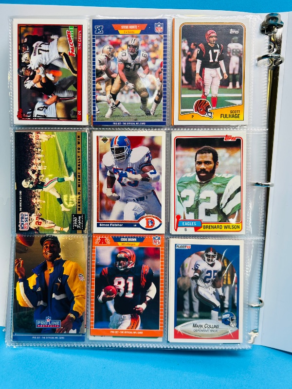 Photo 1 of 165294… final sale no returns/refunds-360 mixed football cards in binder
