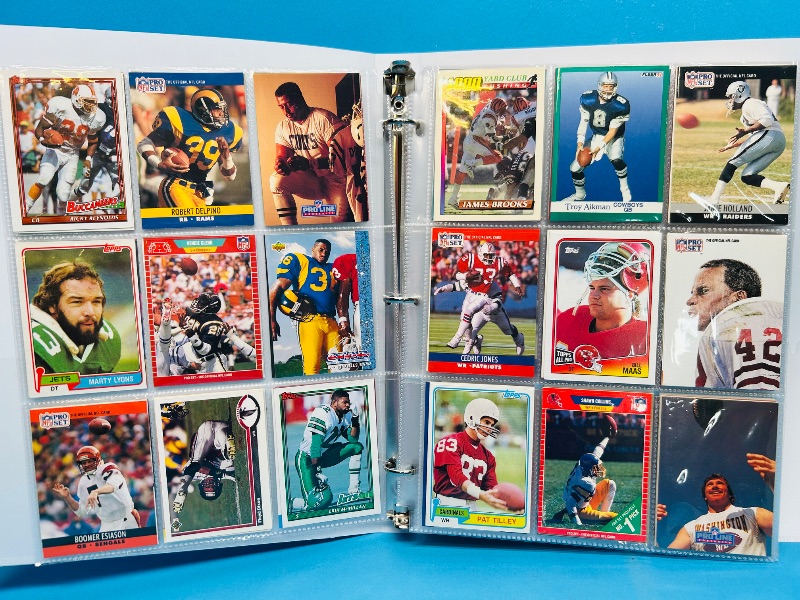 Photo 1 of 165294… final sale no returns/refunds-360 mixed football cards in binder