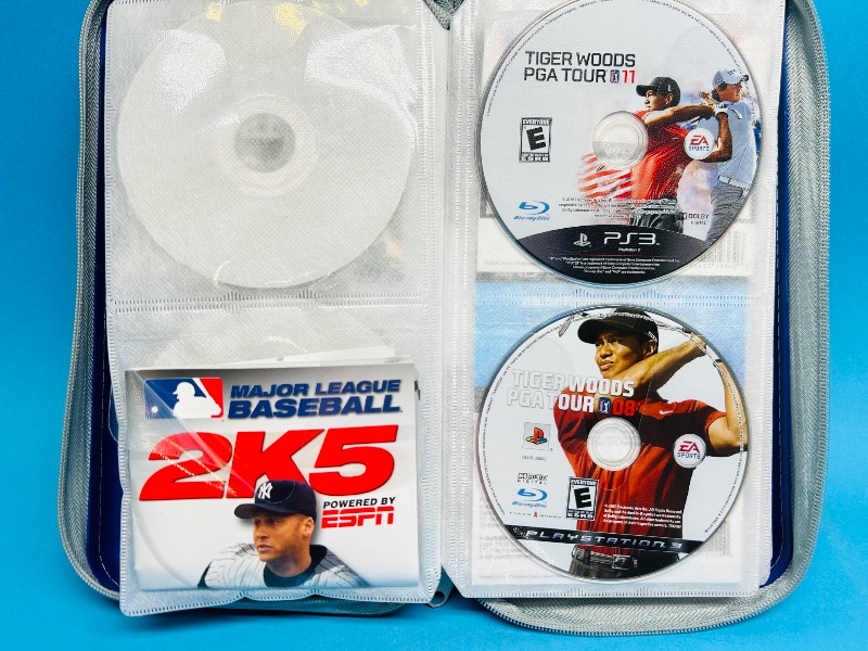Photo 1 of 165295…19 PlayStation2 and 3 game discs in binder