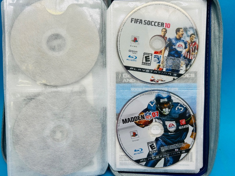 Photo 1 of 165295…19 PlayStation2 and 3 game discs in binder