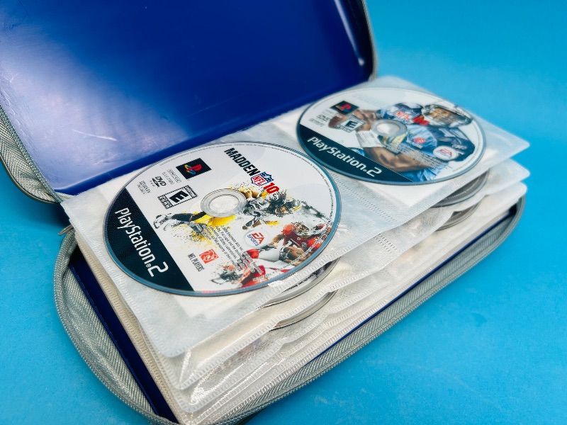 Photo 1 of 165295…19 PlayStation2 and 3 game discs in binder