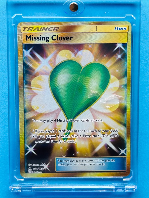 Photo 1 of 165309…Trainer hologram missing clover card in hard plastic case 
