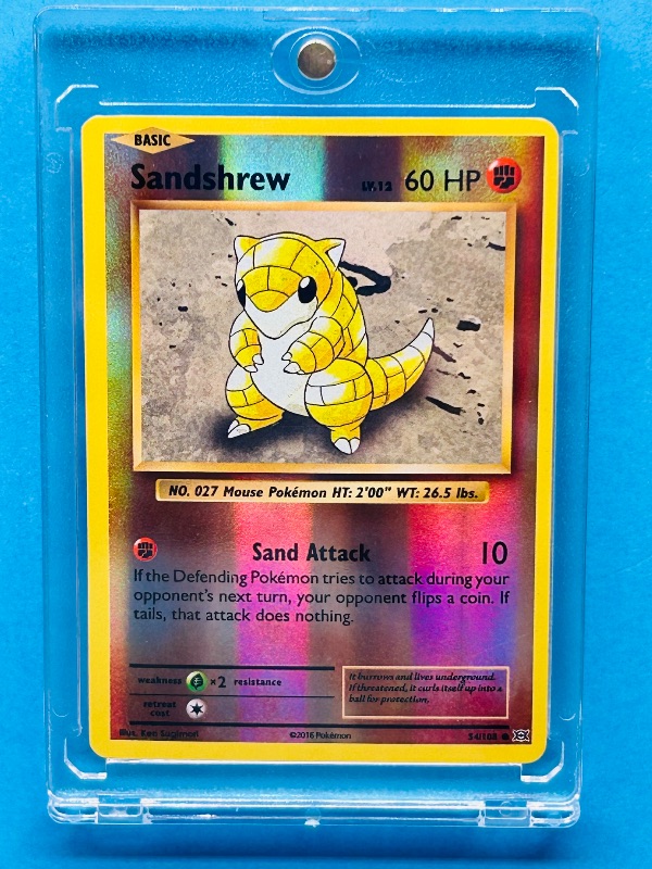 Photo 1 of 165315…hologram Sandshrew Pokémon card in hard plastic case