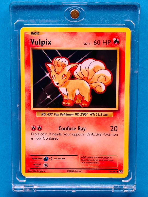 Photo 1 of 165318…Vulpix Pokémon card in hard plastic case