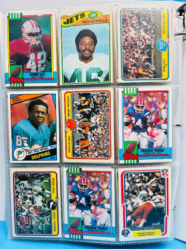 Photo 1 of 165324…final sale no returns/refunds-360 mixed older football cards in binder