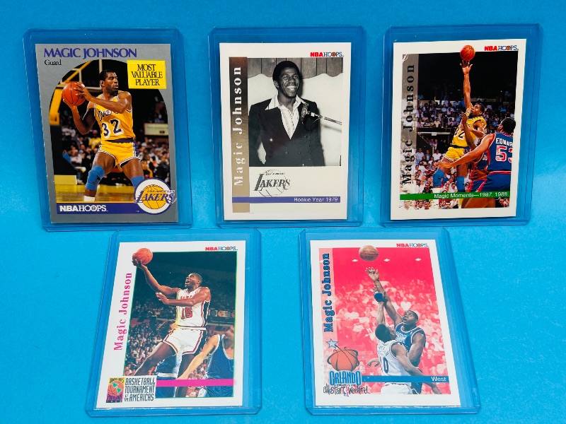 Photo 1 of 165333…5 Magic Johnson cards in hard plastic sleeves 