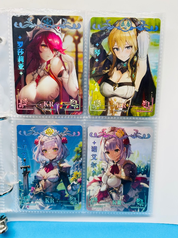 Photo 1 of 165345…final sale no returns/refunds-32 mixed holo anime cards in binder-Japan