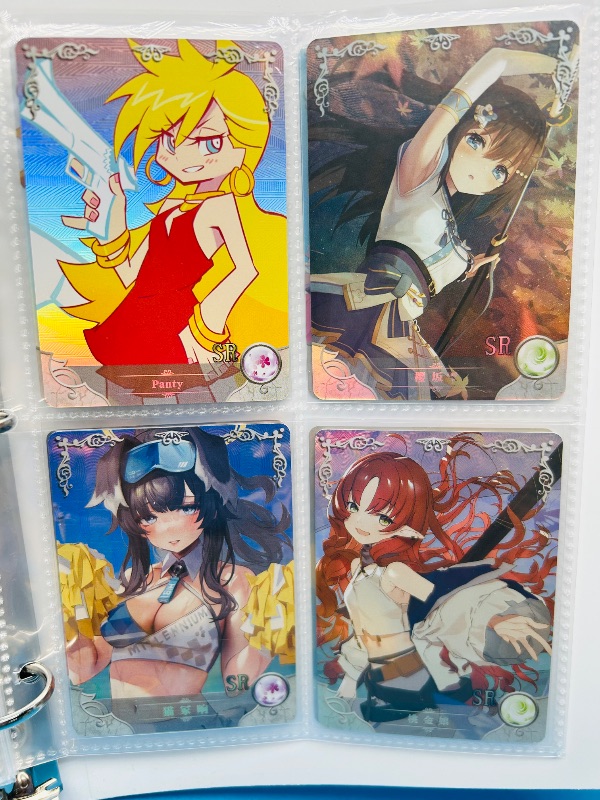 Photo 1 of 165346… final sale no returns/refunds-60 mixed holo anime cards in binder-Japan