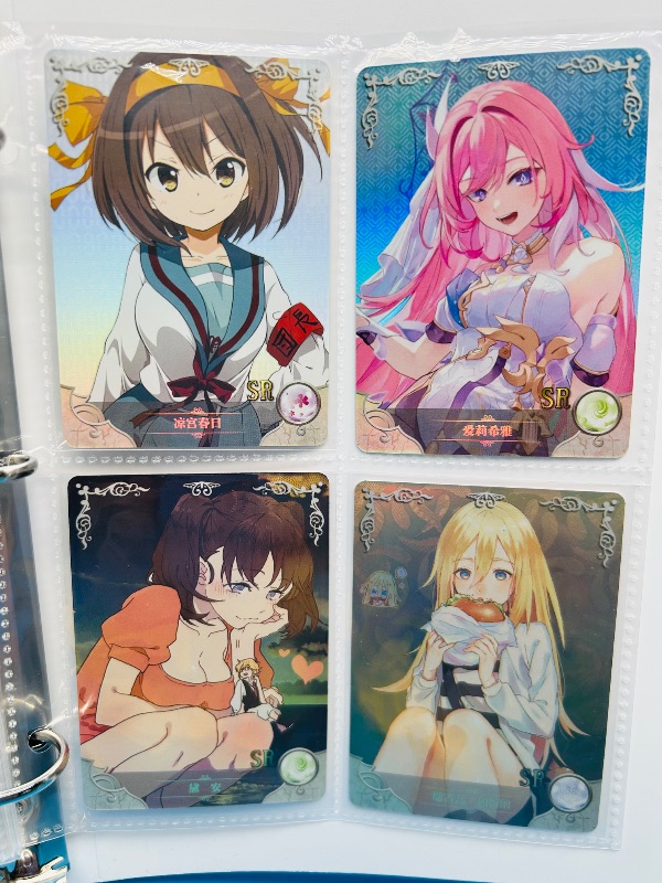 Photo 1 of 165346… final sale no returns/refunds-60 mixed holo anime cards in binder-Japan