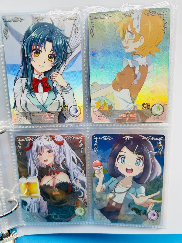 Photo 1 of 165346… final sale no returns/refunds-60 mixed holo anime cards in binder-Japan