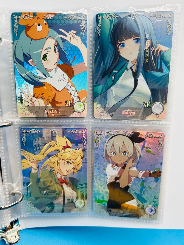 Photo 1 of 165346… final sale no returns/refunds-60 mixed holo anime cards in binder-Japan