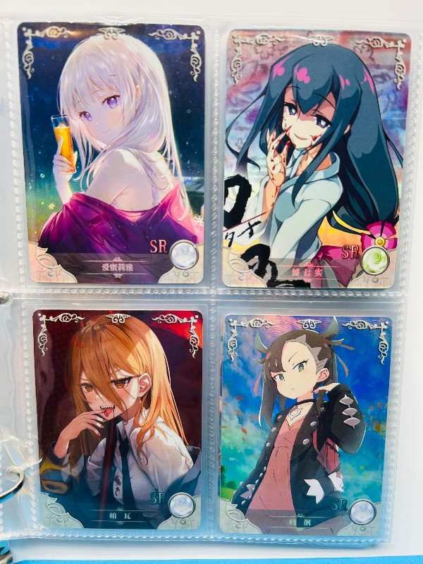 Photo 1 of 165346… final sale no returns/refunds-60 mixed holo anime cards in binder-Japan
