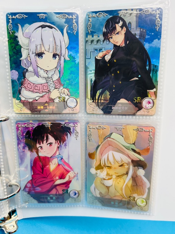 Photo 1 of 165346… final sale no returns/refunds-60 mixed holo anime cards in binder-Japan