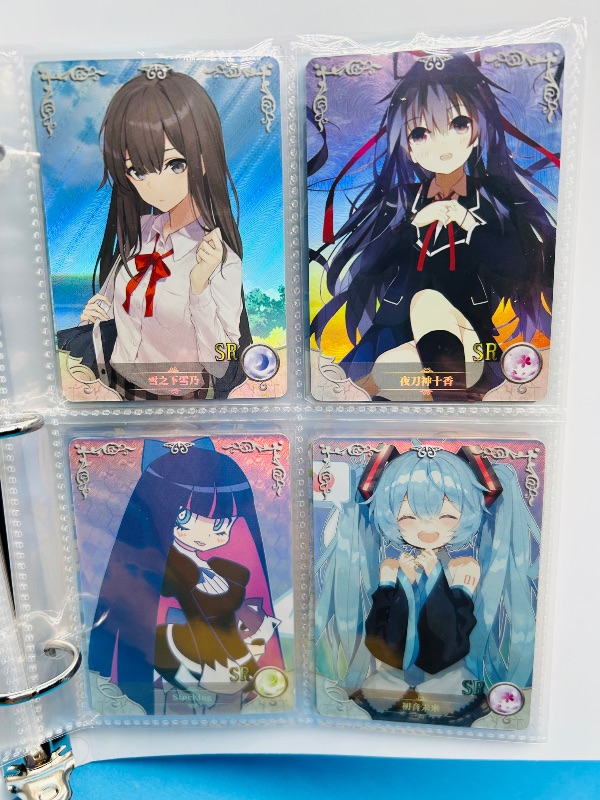 Photo 1 of 165346… final sale no returns/refunds-60 mixed holo anime cards in binder-Japan