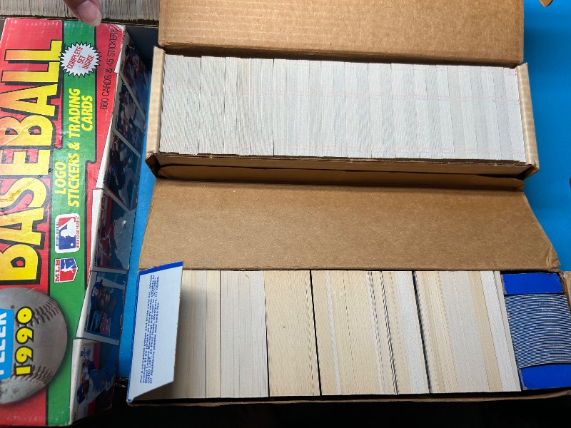 Photo 1 of 165348…final sale no returns/refunds- thousands of mixed sports cards- sets may not be complete. Older cards may have wear from age.-baseball, football, hockey, and basketball 