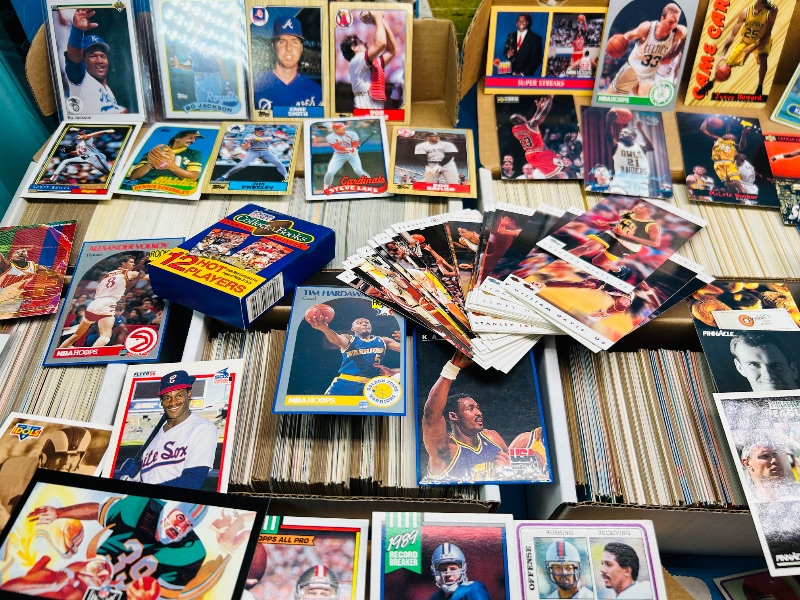 Photo 1 of 165348…final sale no returns/refunds- thousands of mixed sports cards- sets may not be complete. Older cards may have wear from age.-baseball, football, hockey, and basketball 