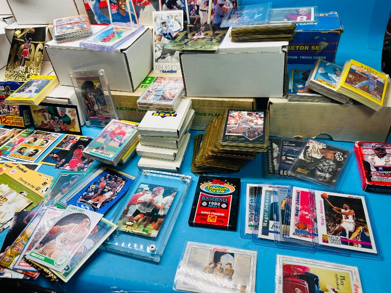 Photo 1 of 165348…final sale no returns/refunds- thousands of mixed sports cards- sets may not be complete. Older cards may have wear from age.-baseball, football, hockey, and basketball 