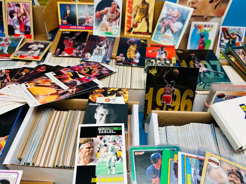 Photo 1 of 165348…final sale no returns/refunds- thousands of mixed sports cards- sets may not be complete. Older cards may have wear from age.-baseball, football, hockey, and basketball 