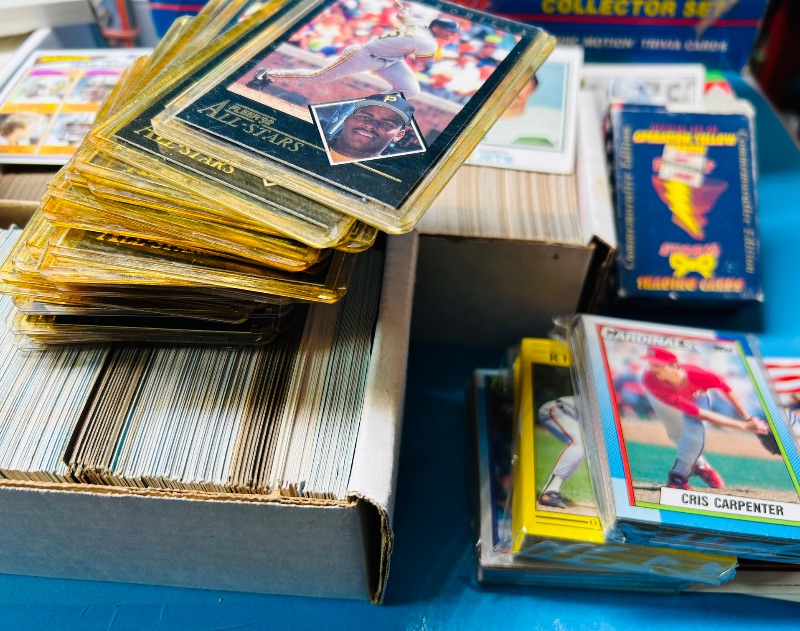 Photo 1 of 165348…final sale no returns/refunds- thousands of mixed sports cards- sets may not be complete. Older cards may have wear from age.-baseball, football, hockey, and basketball 