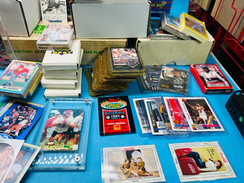 Photo 1 of 165348…final sale no returns/refunds- thousands of mixed sports cards- sets may not be complete. Older cards may have wear from age.-baseball, football, hockey, and basketball 