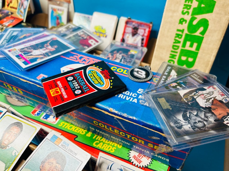 Photo 1 of 165348…final sale no returns/refunds- thousands of mixed sports cards- sets may not be complete. Older cards may have wear from age.-baseball, football, hockey, and basketball 