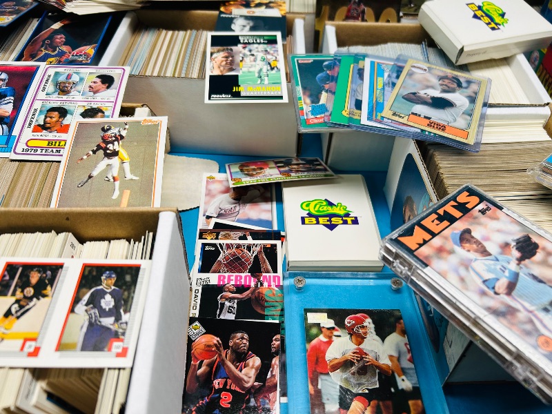 Photo 1 of 165348…final sale no returns/refunds- thousands of mixed sports cards- sets may not be complete. Older cards may have wear from age.-baseball, football, hockey, and basketball 