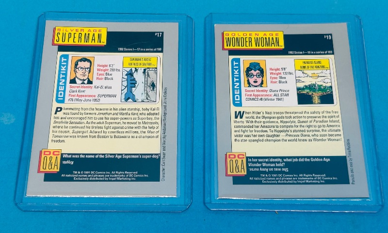 Photo 1 of 165381…1991 Rookie Superman and Wonder Woman cards in hard plastic sleeves 