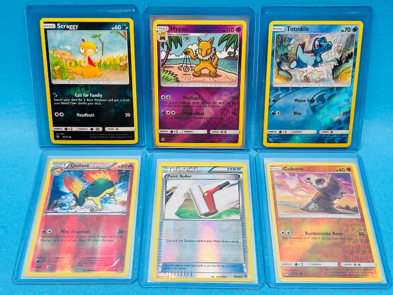 Photo 1 of 165412…6 reverse holo Pokémon cards in hard plastic sleeves 