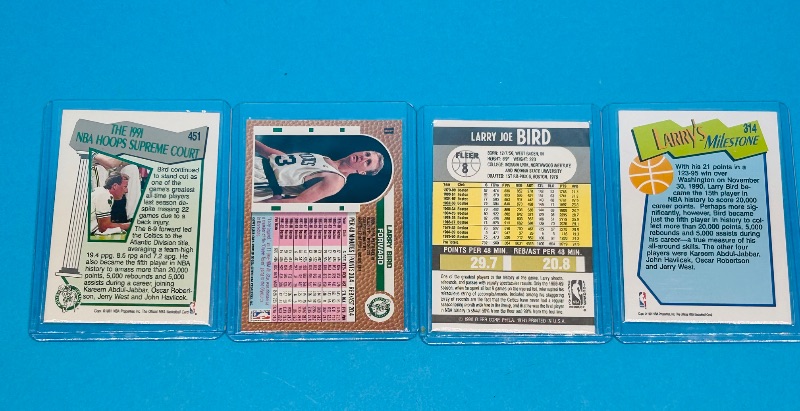 Photo 1 of 165415…4 Larry Bird cards in hard plastic sleeves 
