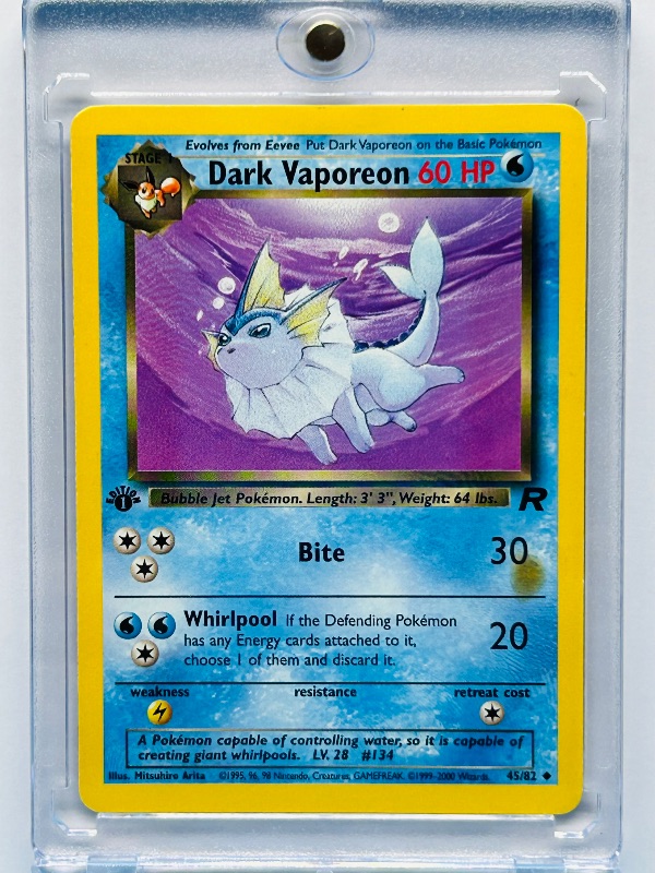 Photo 1 of 165426…Dark Vaporeon Pokémon card in hard plastic case