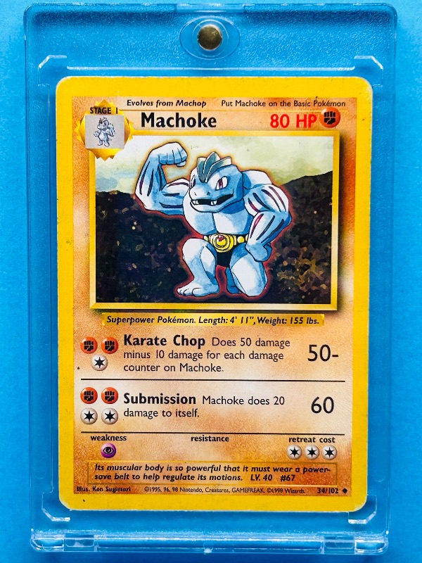 Photo 1 of 165427…Machoke Pokémon card in hard plastic case