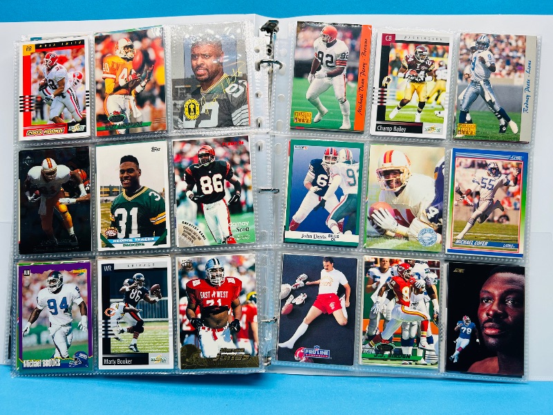 Photo 1 of 165434… final sale no returns/refunds-270 mixed football cards in binder 