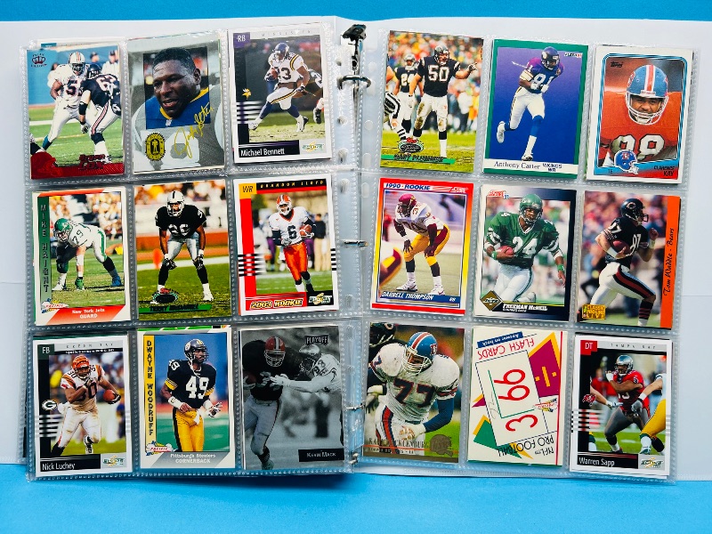 Photo 1 of 165434… final sale no returns/refunds-270 mixed football cards in binder 
