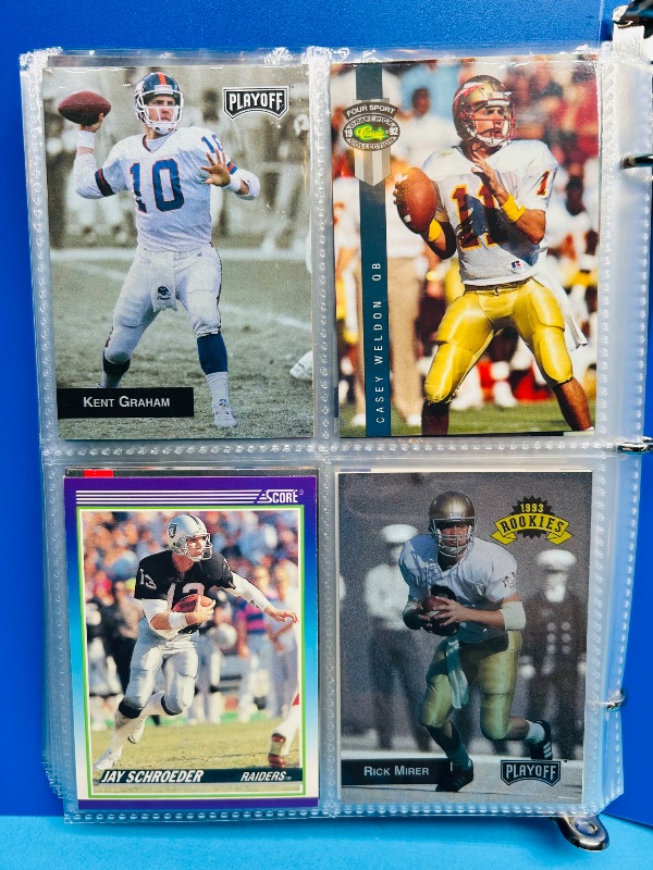 Photo 1 of 165445…final sale no returns/refunds- 104 NFL quarterback cards in binder