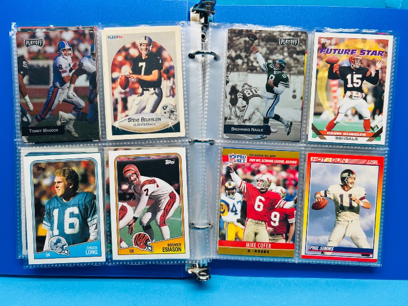 Photo 1 of 165445…final sale no returns/refunds- 104 NFL quarterback cards in binder