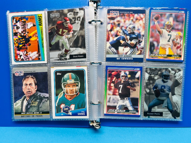Photo 1 of 165445…final sale no returns/refunds- 104 NFL quarterback cards in binder