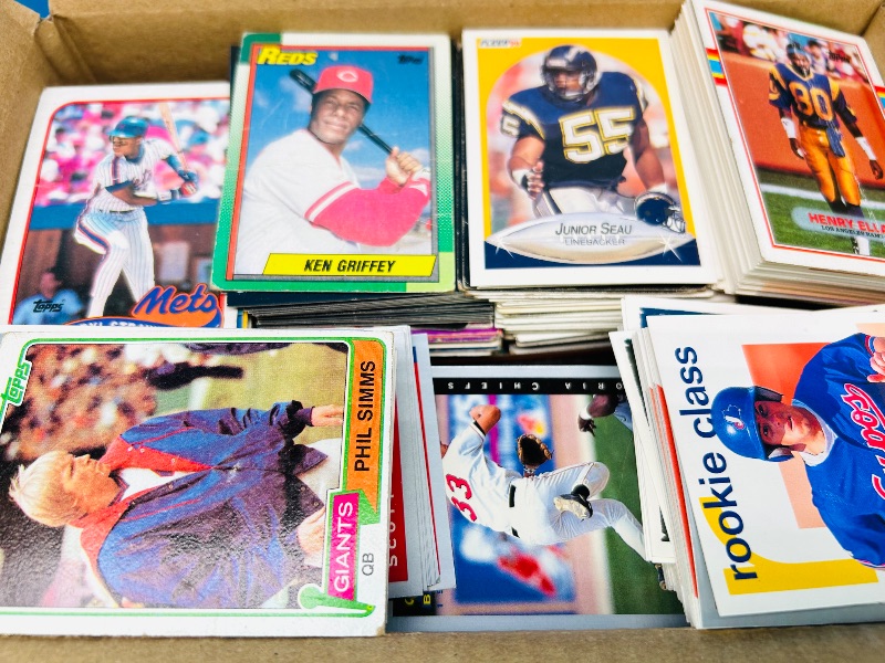 Photo 1 of 165447… final sale no returns/refunds- damaged mixed sports cards in 10 x 5 x 7” box- bent, worn, stains, etc.