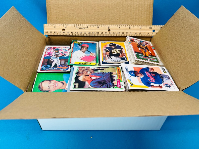 Photo 1 of 165447… final sale no returns/refunds- damaged mixed sports cards in 10 x 5 x 7” box- bent, worn, stains, etc.