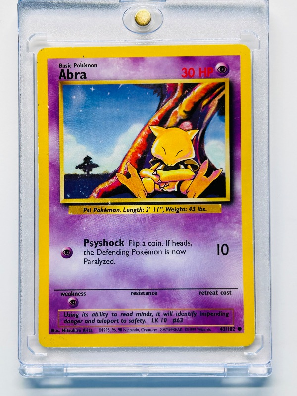 Photo 1 of 165486…Abra Pokémon card in hard plastic case