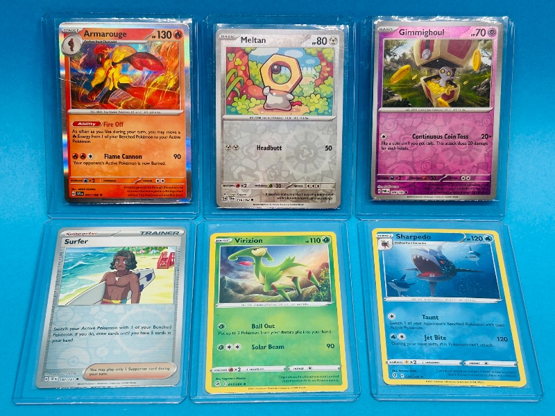 Photo 1 of 165539… 6 reverse and holo Pokémon cards in hard plastic sleeves 