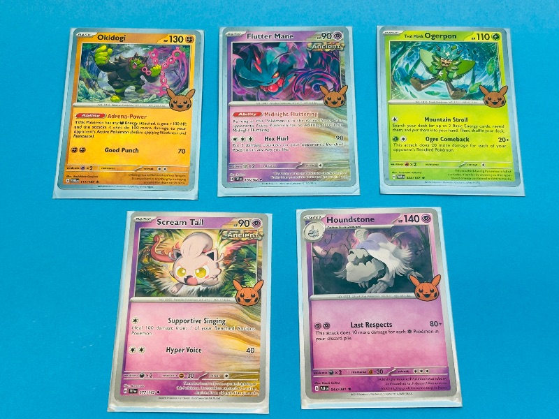 Photo 1 of 165540…5 Pokémon trick or trade cards in plastic sleeves 