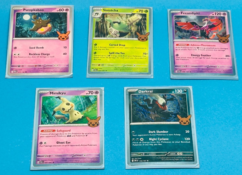 Photo 1 of 165541…5 Pokémon trick or trade cards in plastic sleeves 